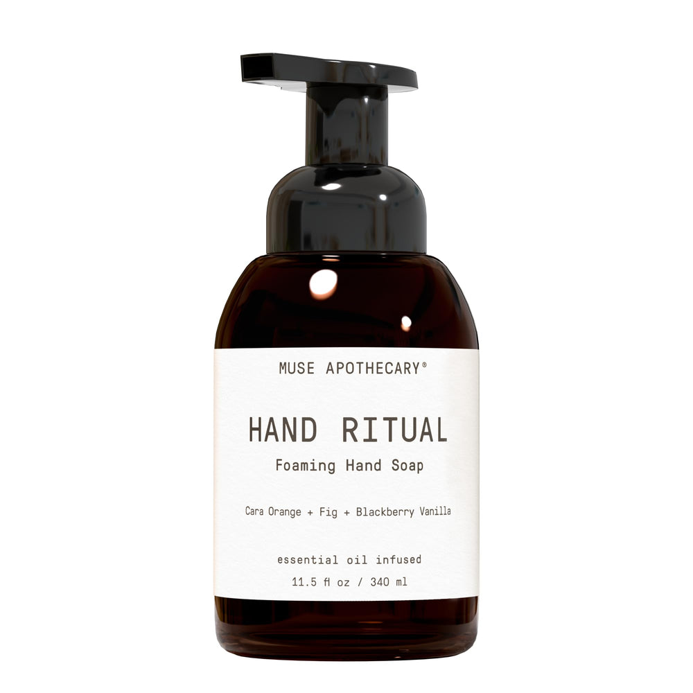 Muse Apothecary Hand Ritual bottle pour reveals cleansing lather and essential oils.