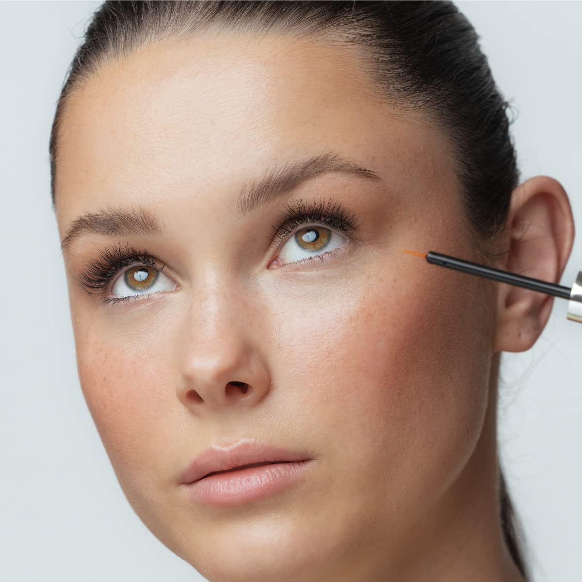 MUSKD eyelash growth serum packaging displaying vegan-friendly design.