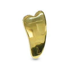 Myolift Gua Sha bronze tool with smooth edges for gentle facial massage and toning.