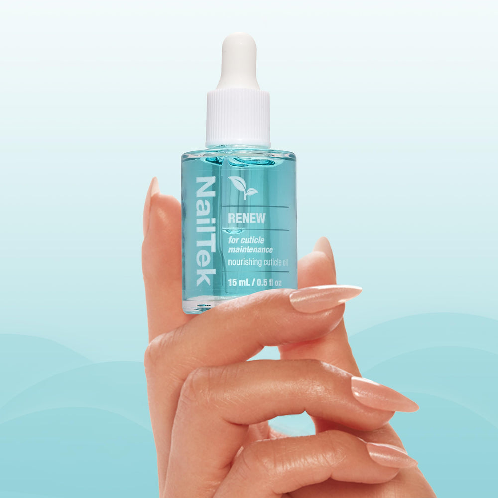 Nail Tek Renew Cuticle Oil pocket-sized bottle for on-the-go care.