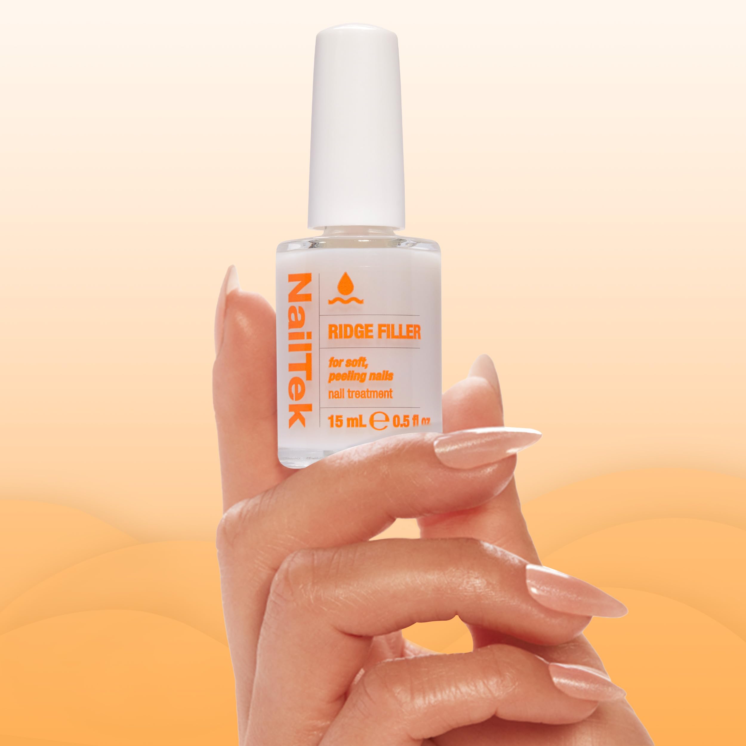 Nail Tek Ridge Filler acts as a clear base coat for better polish grip.