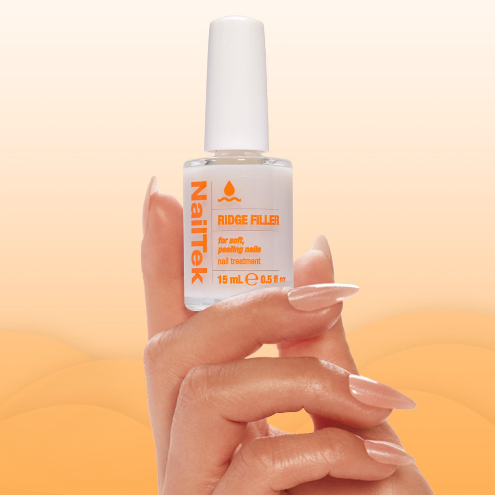 Nail Tek Ridge Filler acts as a clear base coat for better polish grip.