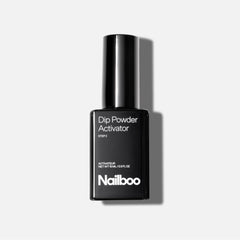 Nailboo Activator bottle closeup for quick, long-lasting dip manicures.