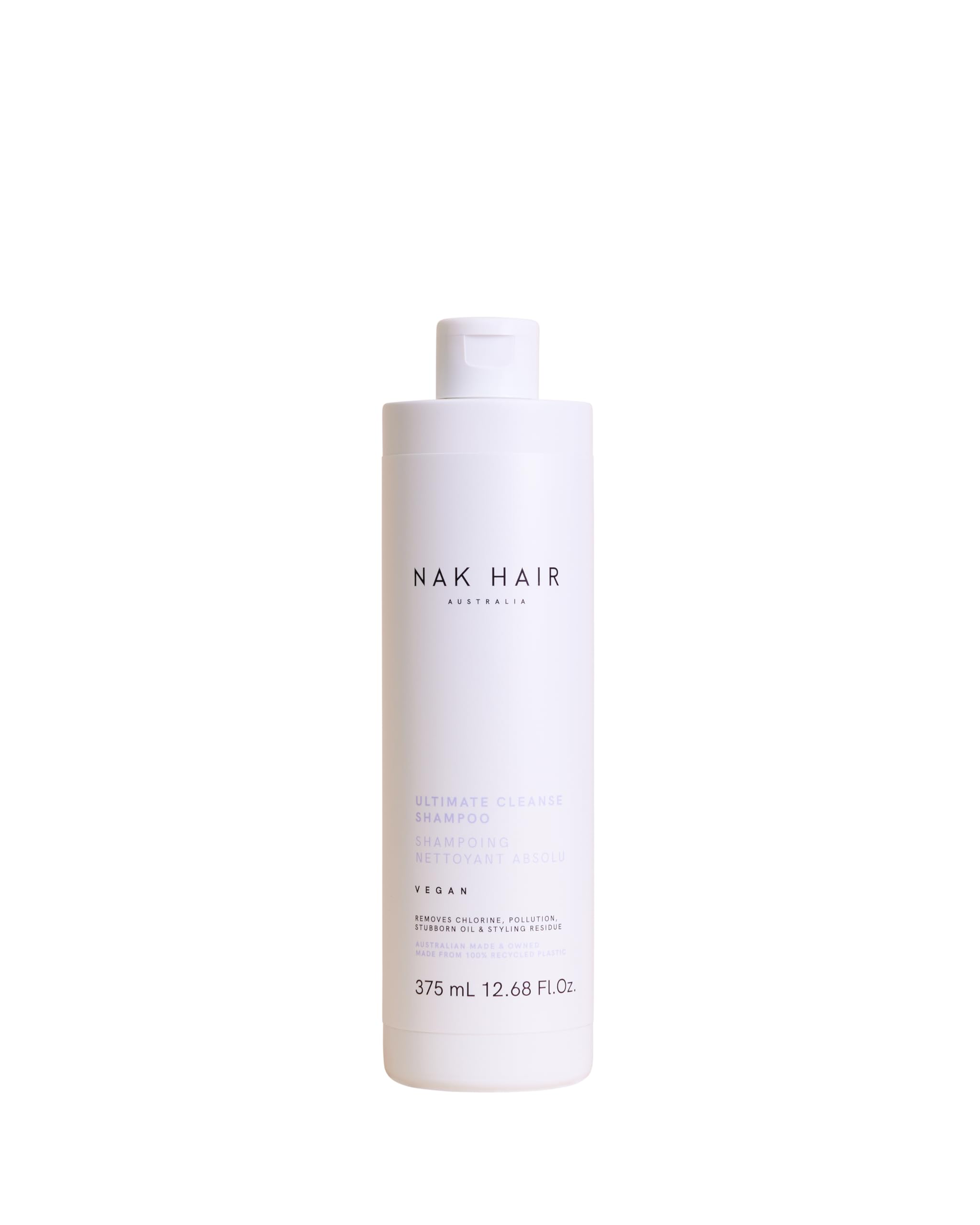 NAK Hair Australia Ultimate Cleanse bottle being poured for cleansing