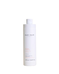 NAK Hair Australia Volume Shampoo bottle front for volumised hair