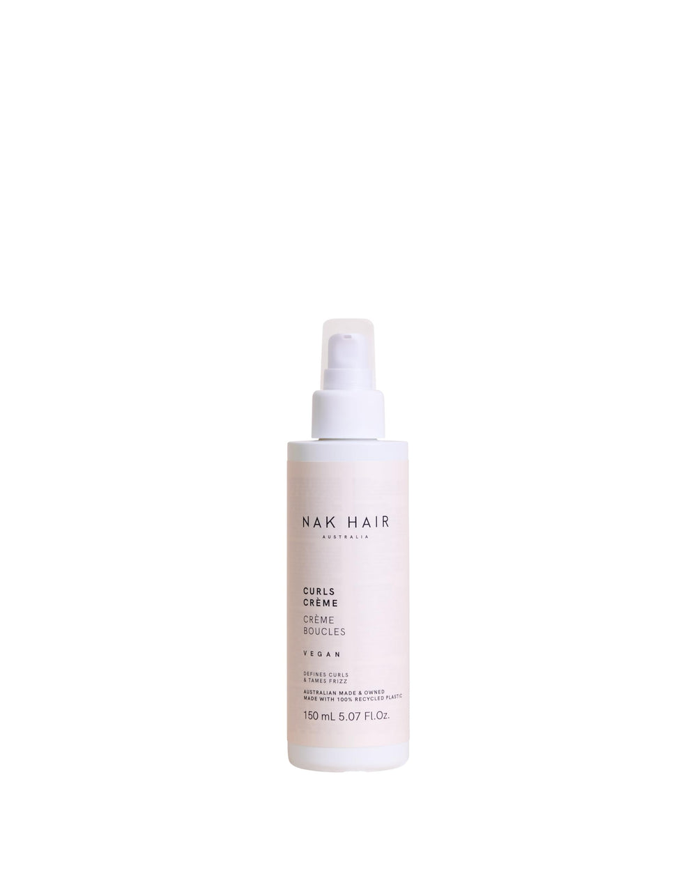 NAK Hair Curls Creme bottle close-up highlighting frizz-taming action