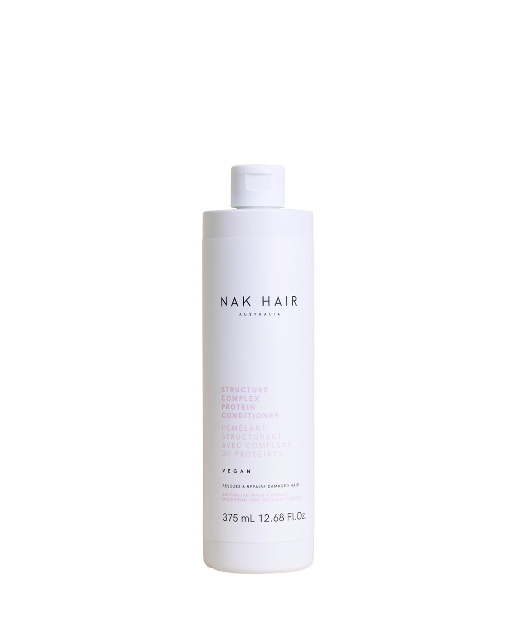 NAK Hair Structure Complex bottle pour for nourished, resilient strands.