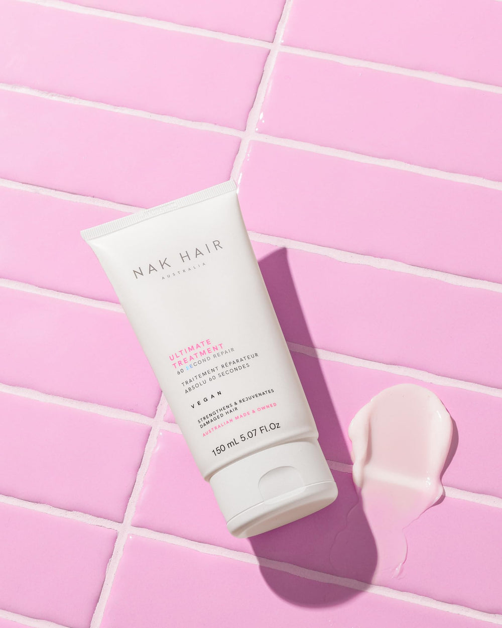 NAK Hair Ultimate Potion application scene showing leave-in hydration