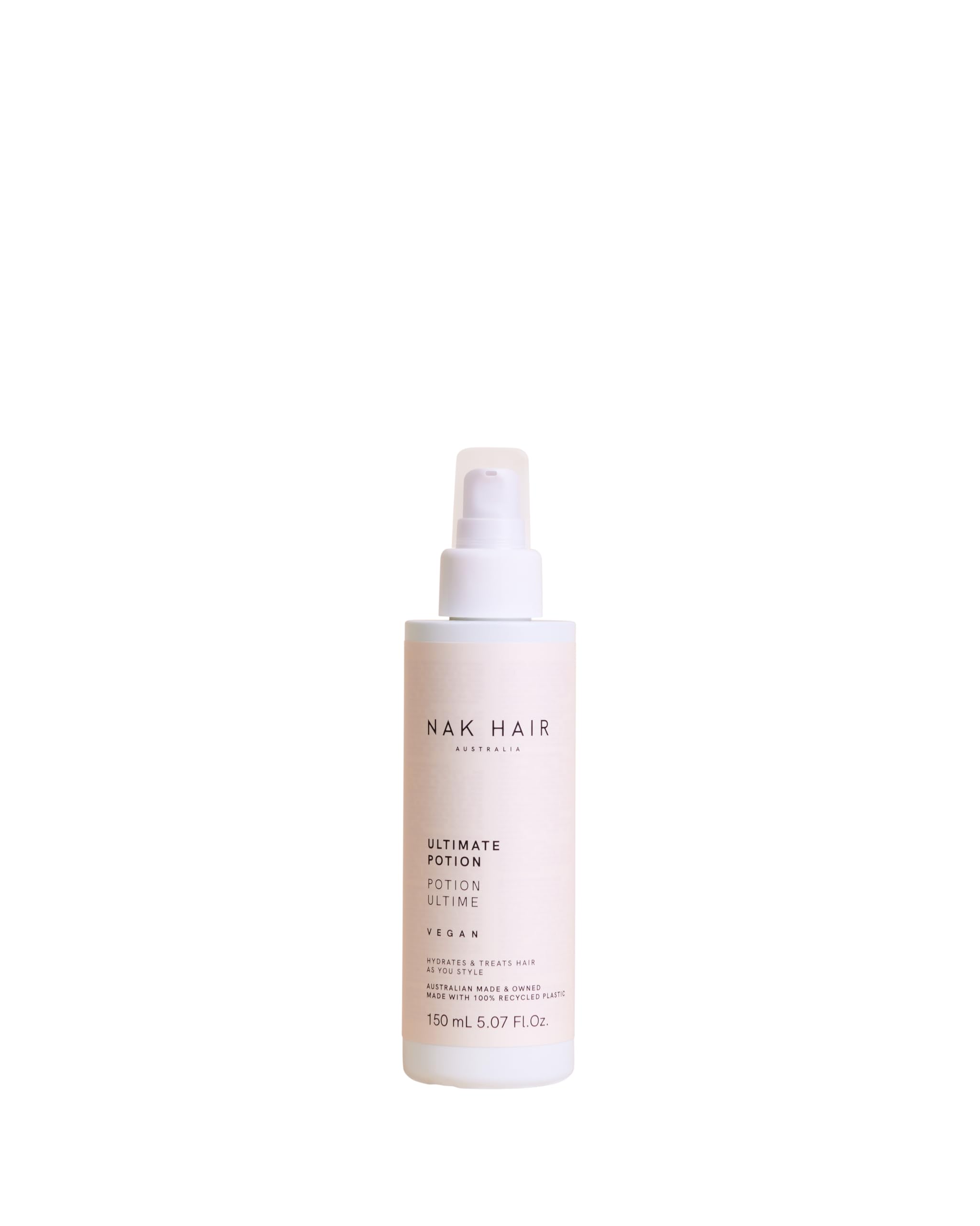 NAK Hair Ultimate Potion bottle on counter for frizz control and shine