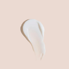 NAK Hair application scene shows massaging to distribute for smoother, softer hair.