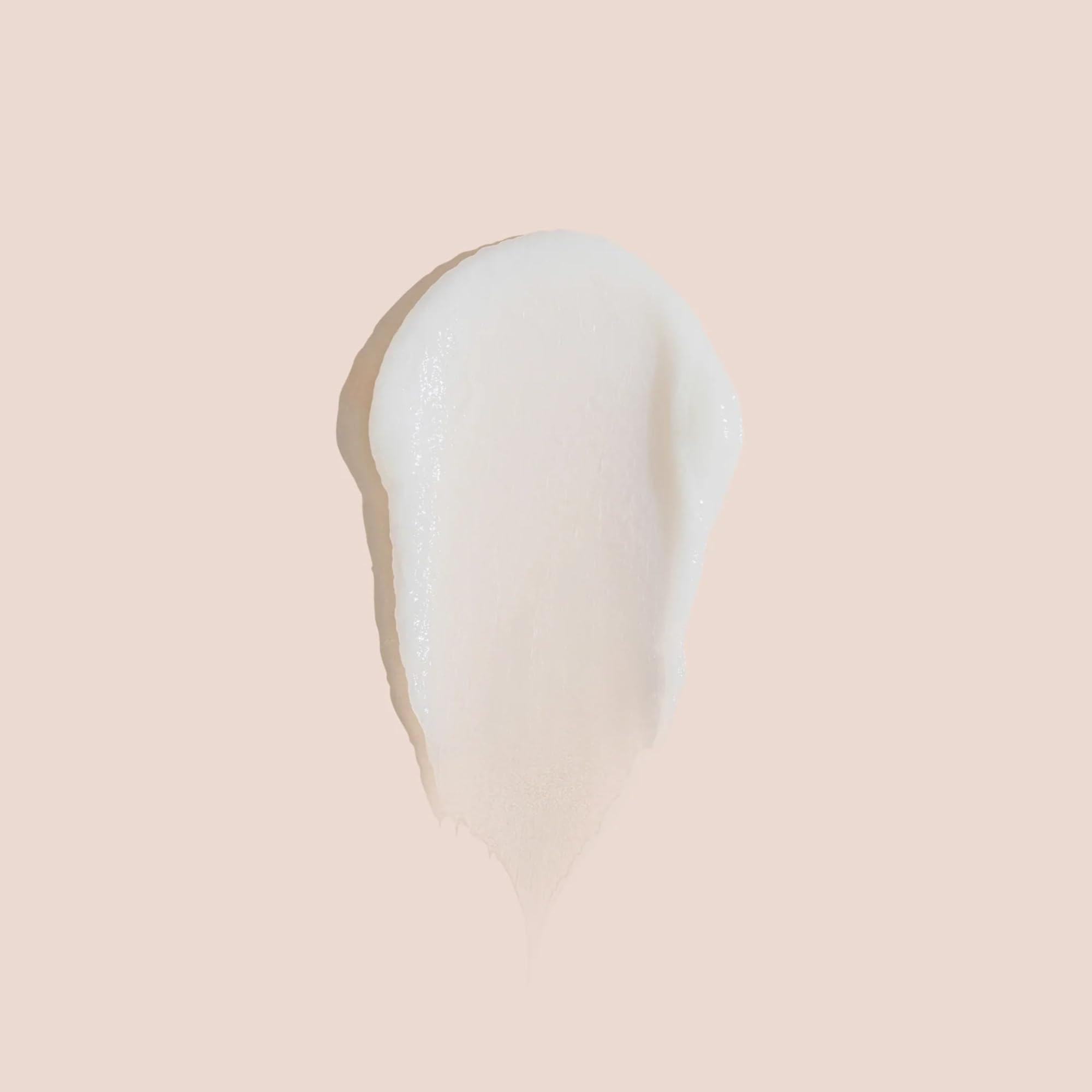 NAK Hair Volume Conditioner bottle side angle showcasing rich texture and easy rinse