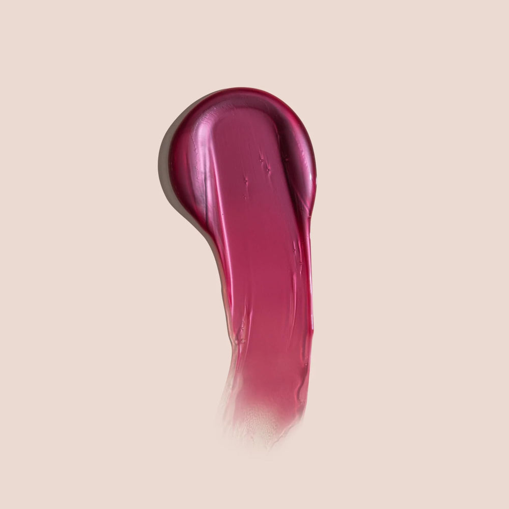 NAK Rose Blonde Shampoo lather on wet hair enhances color depth.