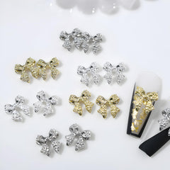 Namrec 3D alloy bow nail charms in silver for elegant nail accents
