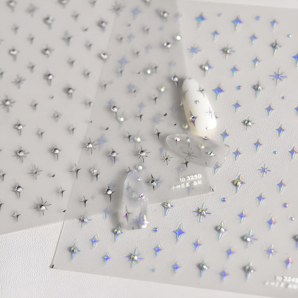5D embossed star decals add glittery shine to nails.