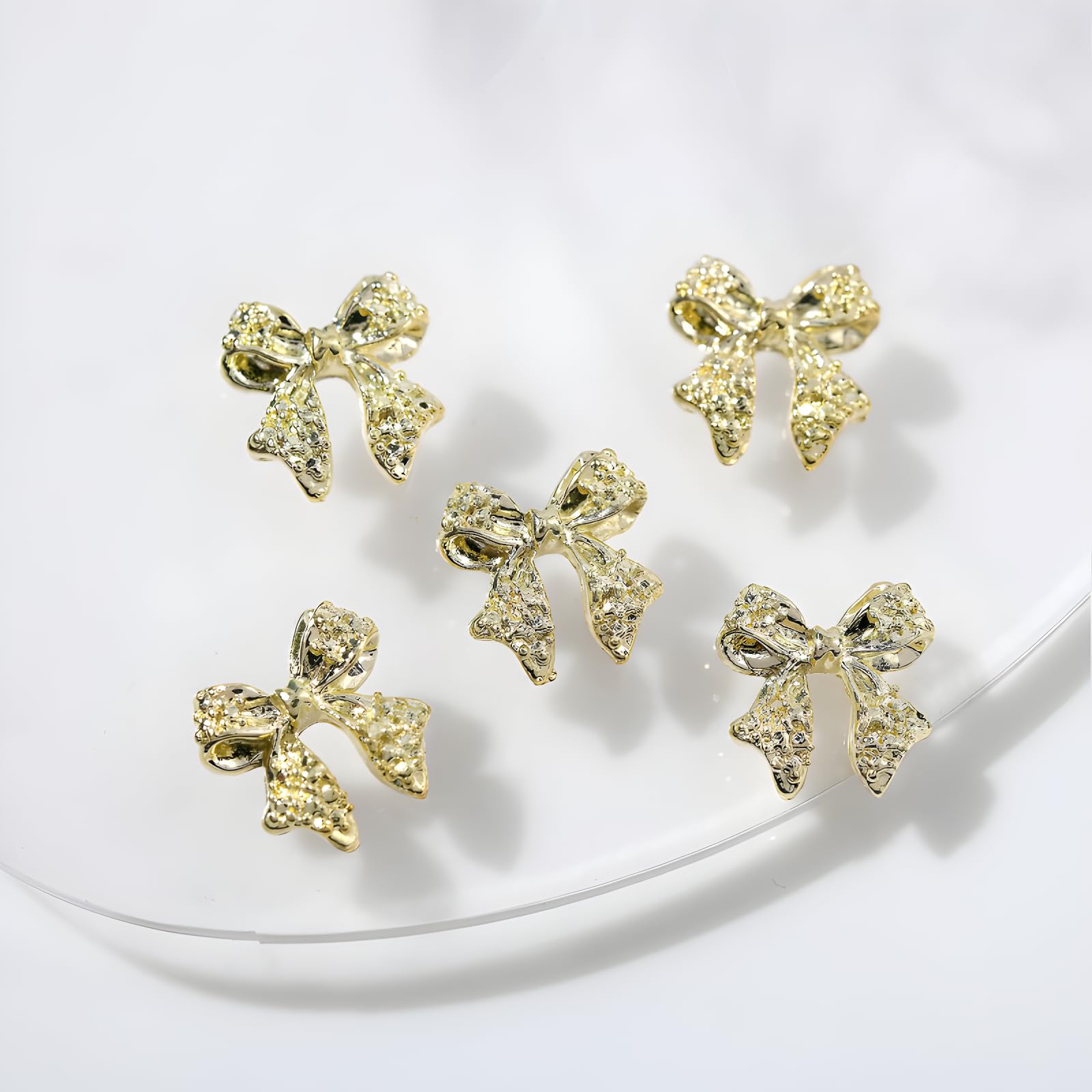 Namrec crystal rhinestones close-up on a bow charm