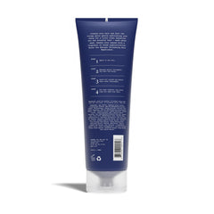 Hand with foamy Nanogen shampoo showing gentle cleansing and refreshing feel.