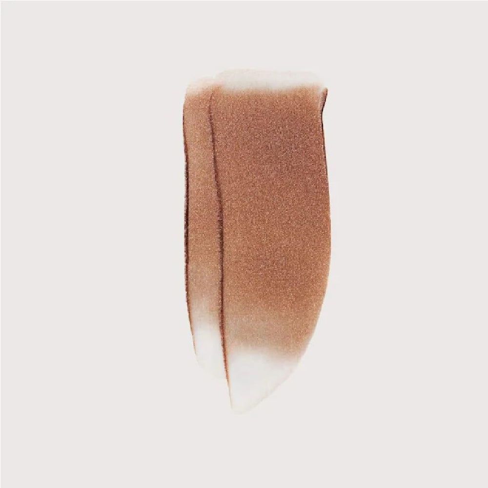 NAPH M Day Glow swatch on skin showing subtle, everyday shimmer.