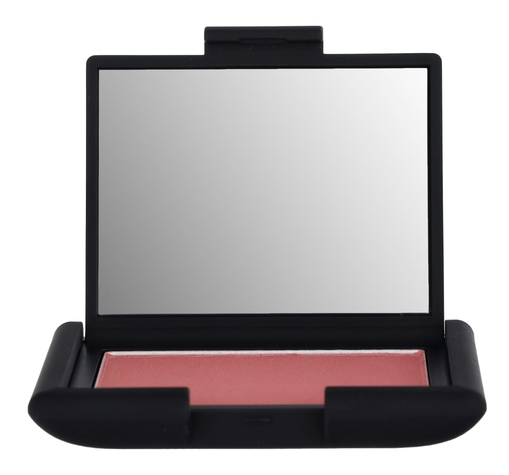 Close-up of applying NARS Dolce Vita blush highlighting buildable color and weightless texture.