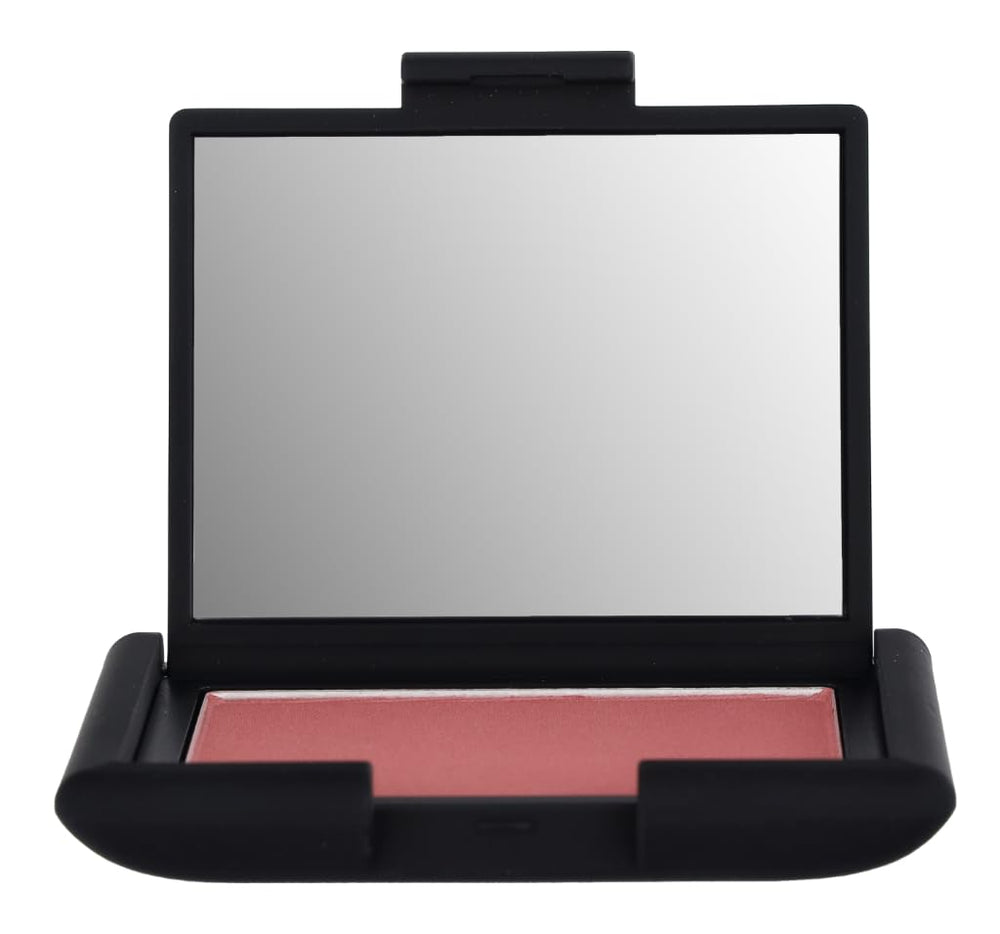 Close-up of applying NARS Dolce Vita blush highlighting buildable color and weightless texture.