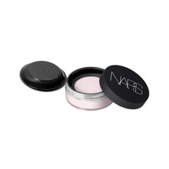 NARS Light Reflecting Prismatic Powder Milky Way lavender loose powder adds soft, luminous glow.
