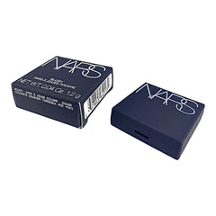 NARS Orgasm travel packaging demonstrates portable glow on the go.
