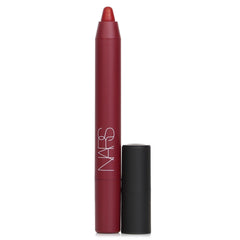 NARS Powermatte Cruella pencil tip close-up with bold red pigment for precise lip definition.