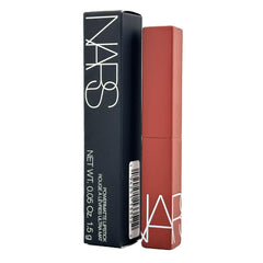 NARS Powermatte Lipstick 102 Killer Queen swatch demonstrates rich color payoff.