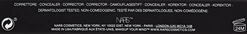 Application close-up of NARS Radiant Creamy Concealer Biscuit demonstrating lightweight coverage
