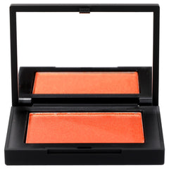 NARS Taj Mahal swatch showing warm golden-berry glow on skin