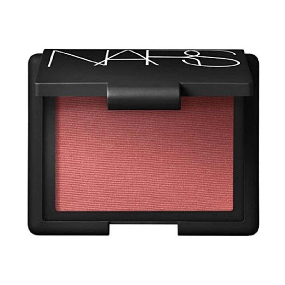 NARS Torrid blush swatch shows warm pink peach glow for a natural flush