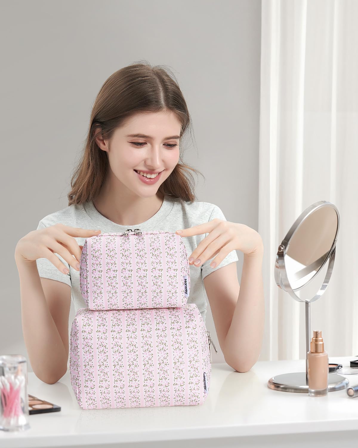 Narwey floral makeup bag water-resistant fabric protects cosmetics.