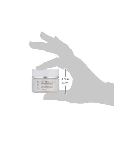 NassifMD eye care application close-up shows gentle patting technique.