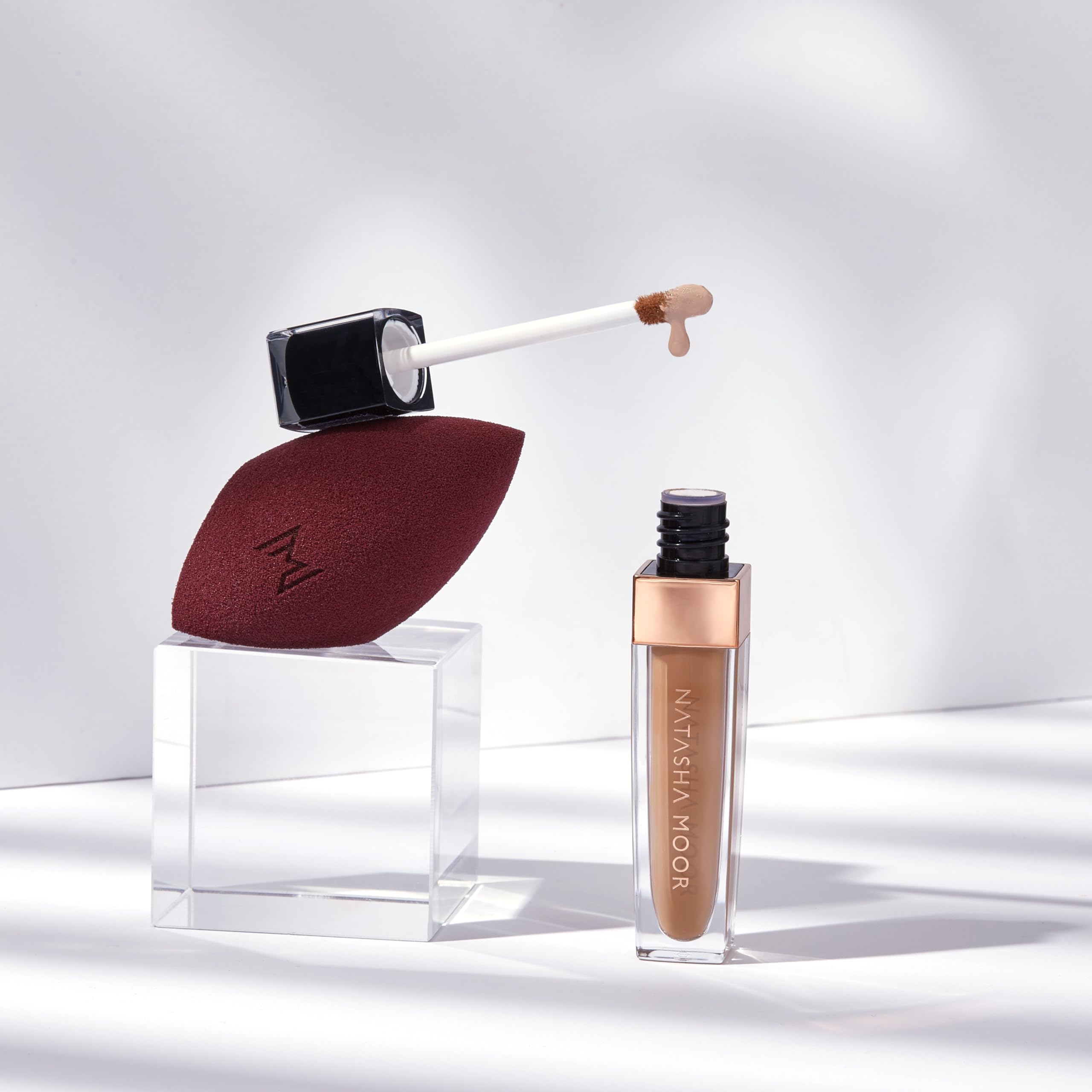 NATASHA MOOR Liquid Magic Concealer under-eye application during morning routine.