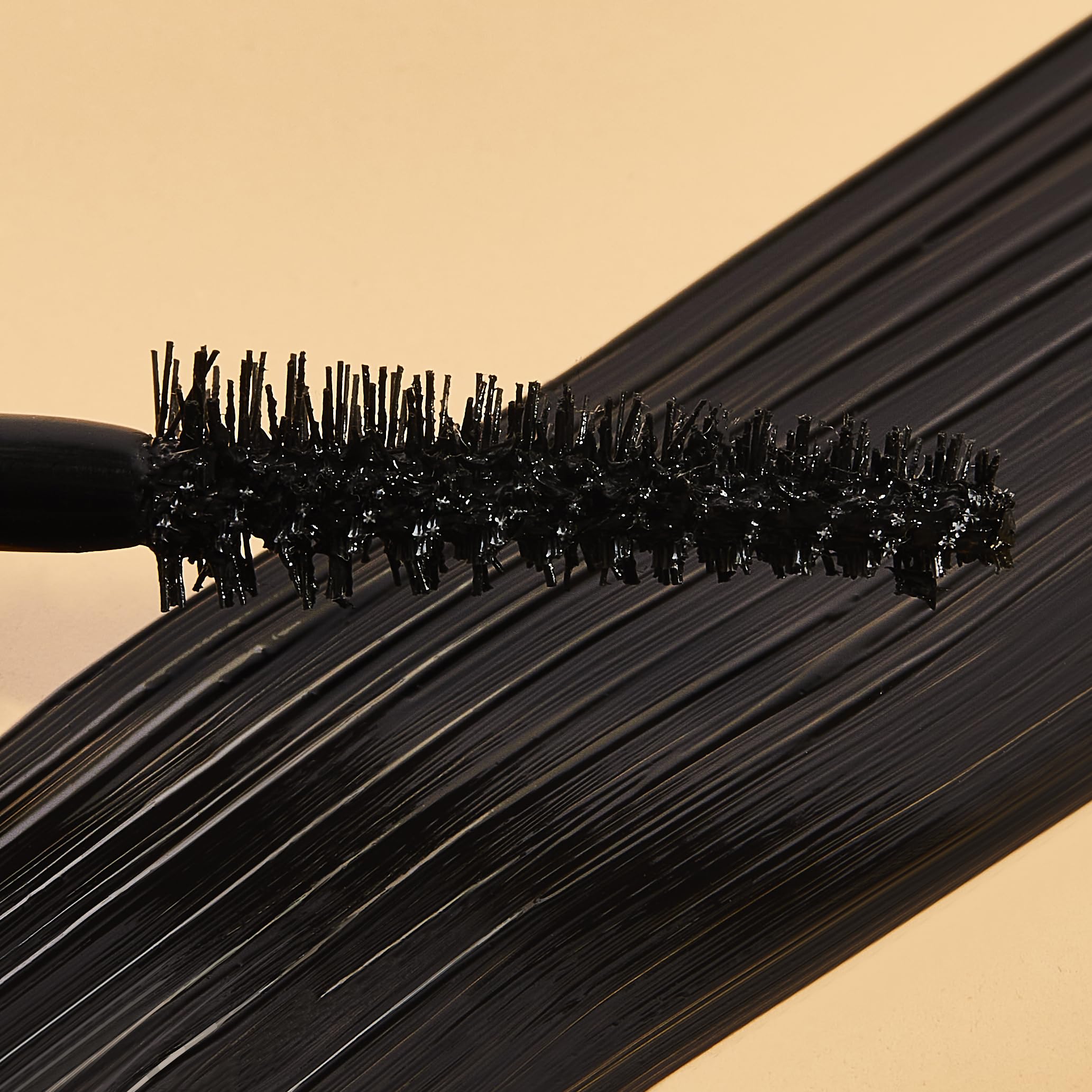 Natasha Moor Moor Power Mascara wand close-up reveals lengthening potential.