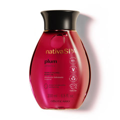 NATIVA SPA Plum Body Oil bottle close-up highlighting rich hydration.
