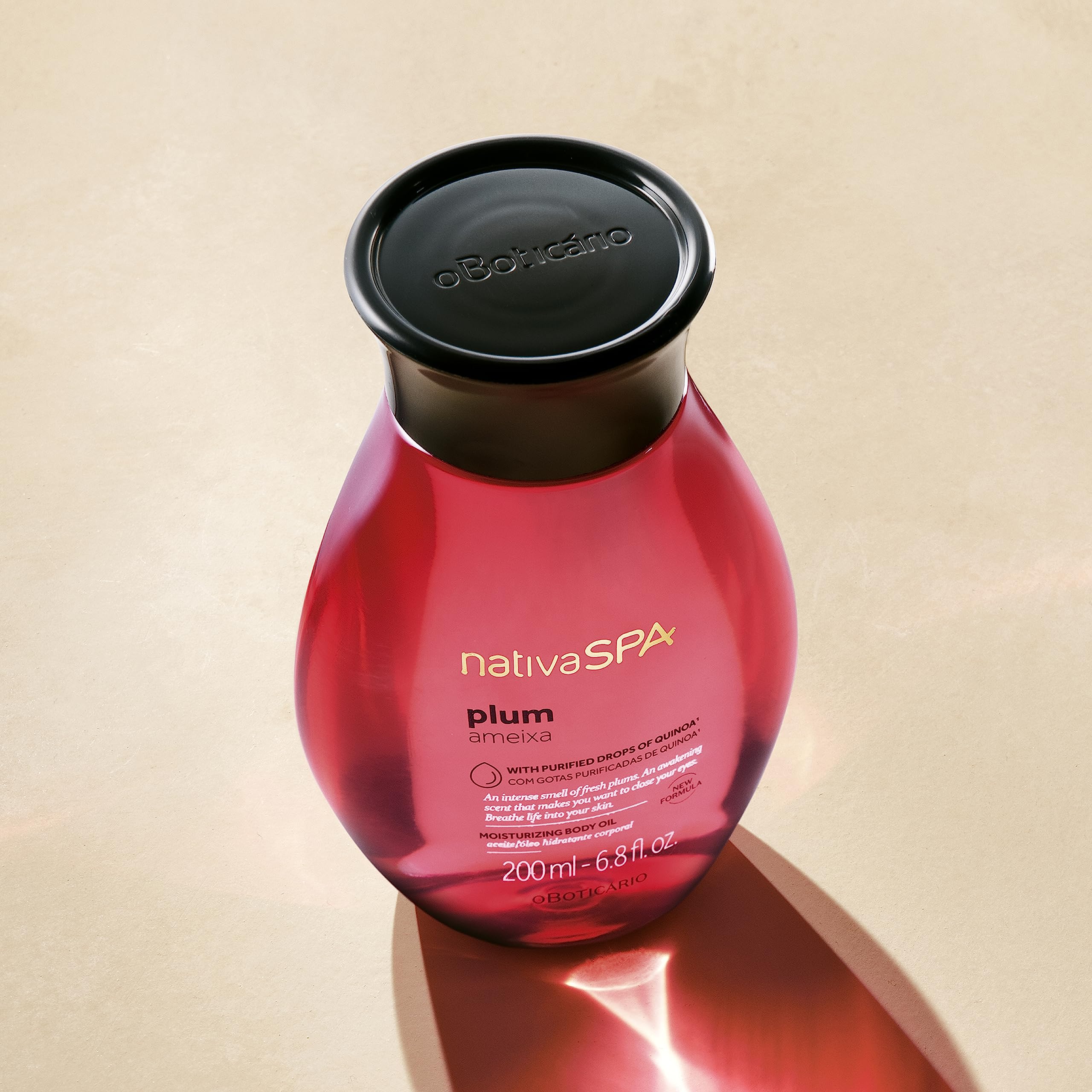 NATIVA SPA Plum Body Oil bottle with woody floriental fragrance.