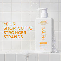 Native conditioner almond and shea butter bottles showcased for nourished, manageable hair.
