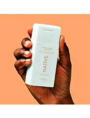 Native travel size body wash bottle with Sweet Peach Nectar scent for a refreshing cleanse