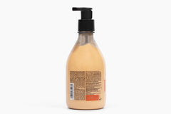 Natura Tukuma lotion texture close-up shows creamy, non-greasy feel.