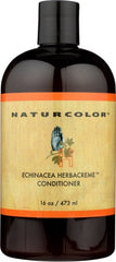 Naturcolor Echinacea Herb Creme Conditioner application on hair for easier styling.