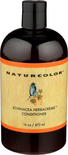 Naturcolor Echinacea Herb Creme Conditioner wrapped in towel for deeper conditioning.