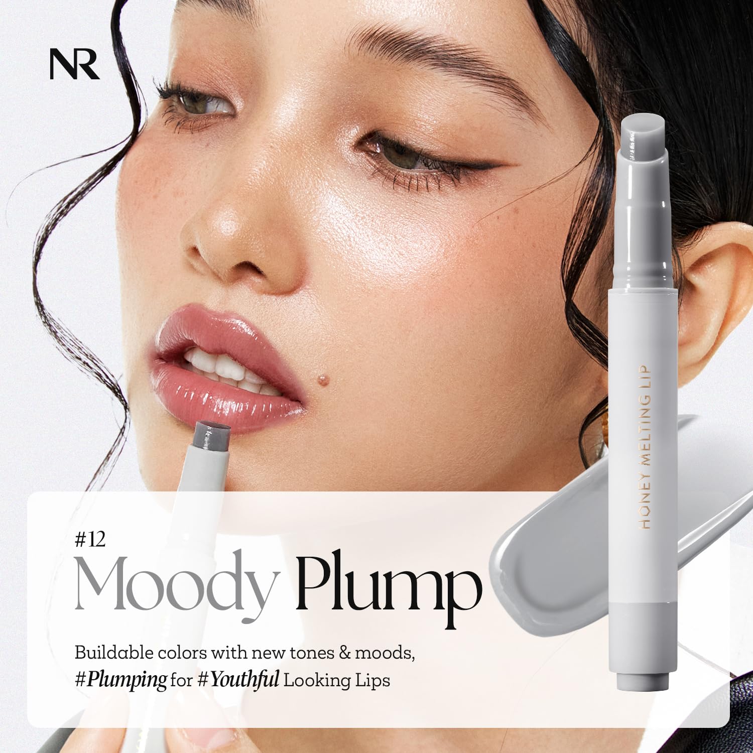 Nature Republic Moody Plump gloss delivers hydrating shine on lips.