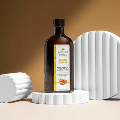 Nature Spell Jojoba Oil glossy hair after use with frizz reduction.