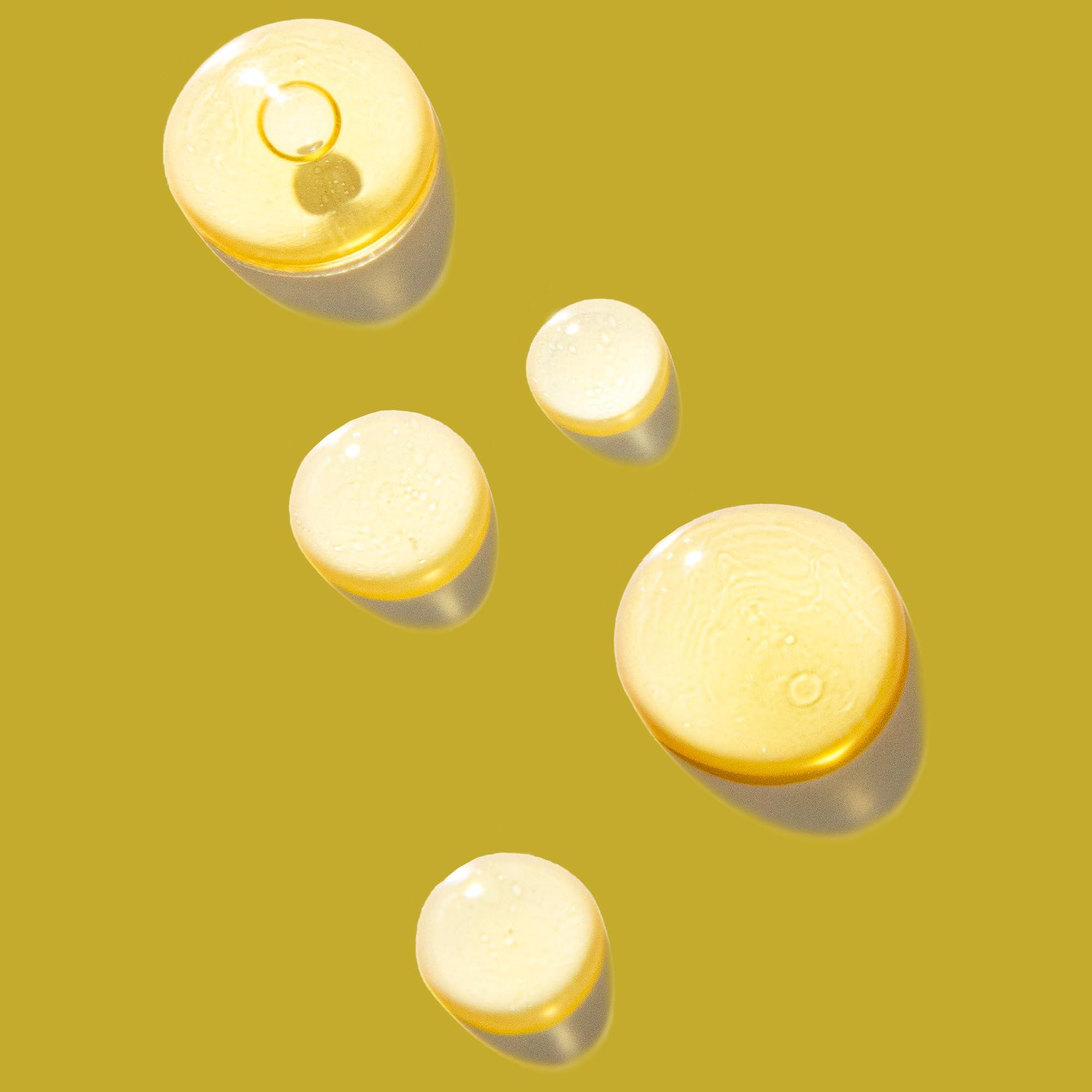 Nature Spell Jojoba Oil being massaged into the scalp to support follicles.