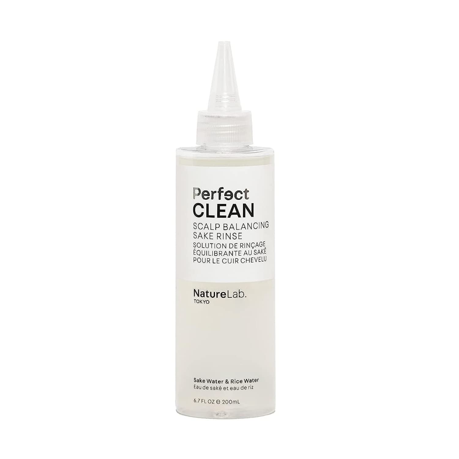 NatureLab TOKYO Perfect Clean Sake Rinse bottle pour demonstrates easy, gentle scalp cleansing
