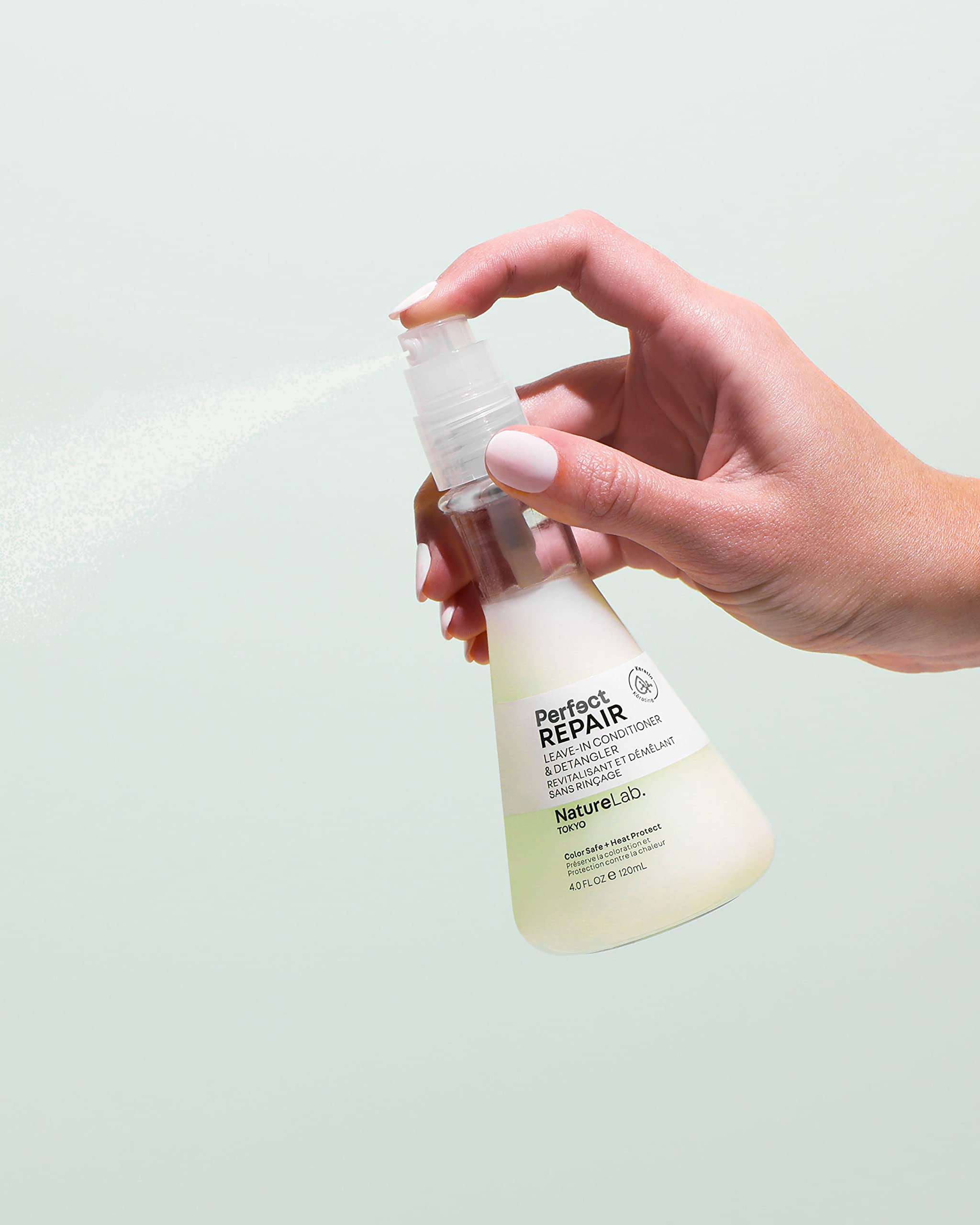 NatureLab.TOKYO Perfect Repair Leave-In showing heat protection during styling.