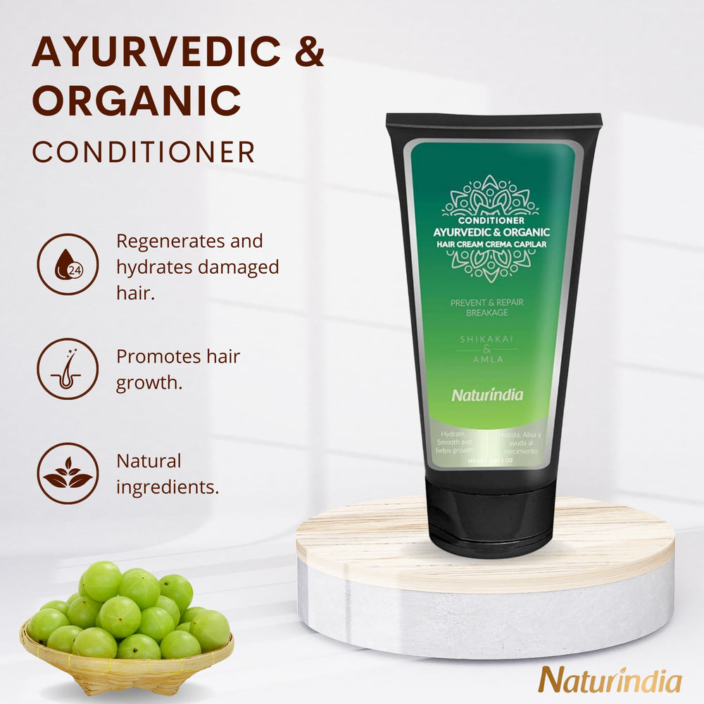 Naturindia conditioner with Shikakai and Amla ingredients label close-up supporting hair vitality