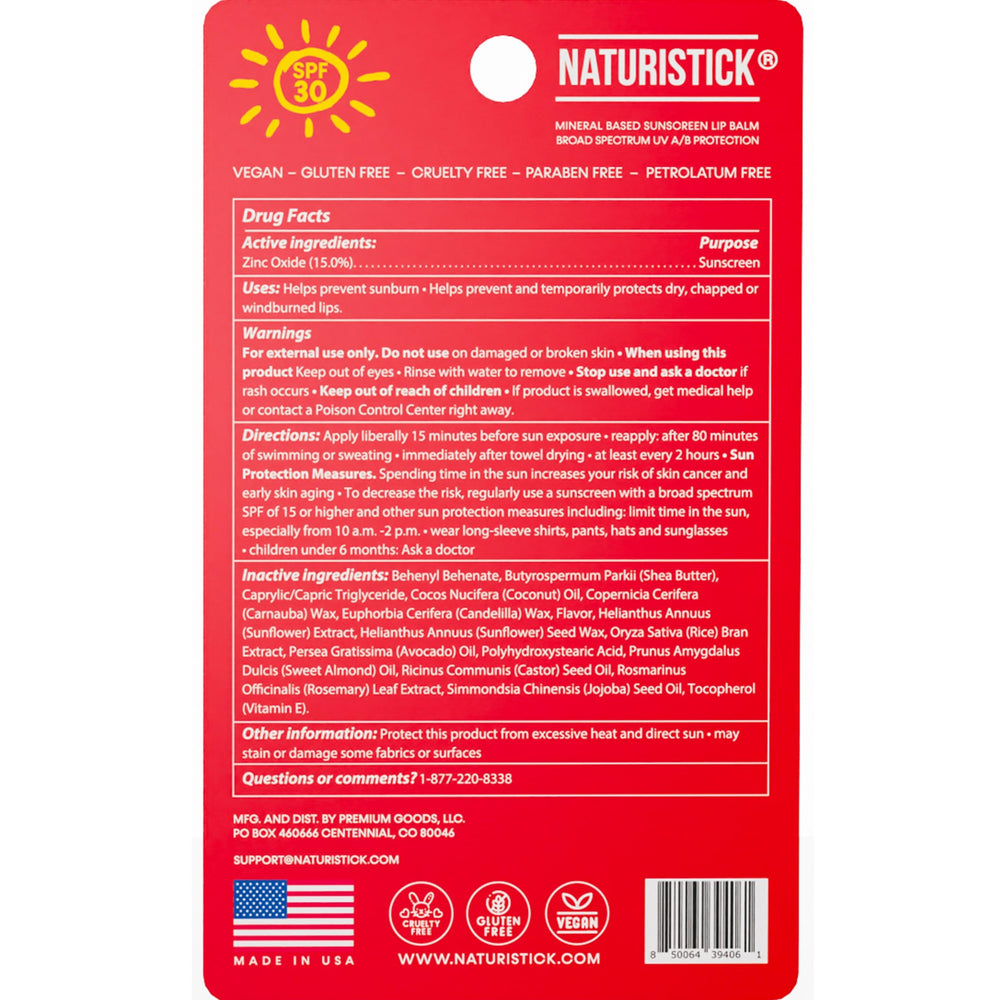 Applying Naturistick lip balm during activity for coral-safe hydration.