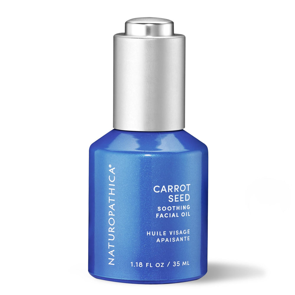 Naturopathica carrot seed soothing face oil bottle for calm, hydrated skin.