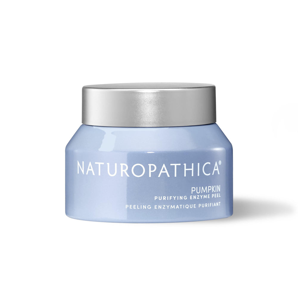 Naturopathica Pumpkin Purifying Enzyme Peel bottle on vanity for at-home pore care.